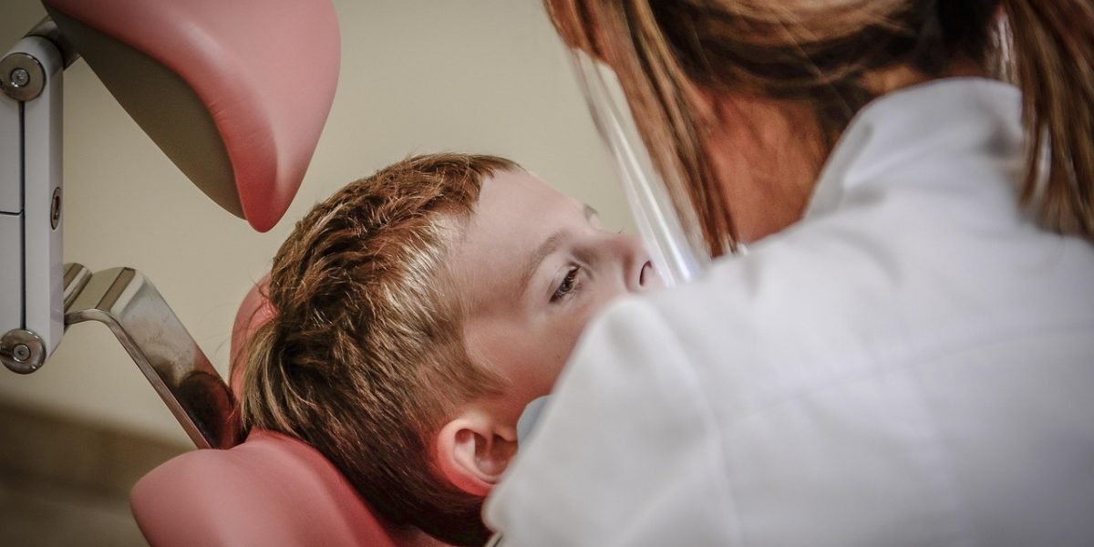 A patient openly discussing medication side effects or long-term concerns with their healthcare provider in a consultation.