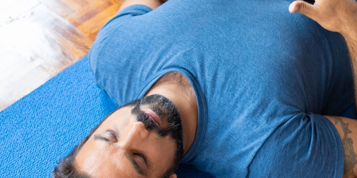A person engaging in mindfulness or breathing exercises to calm anxiety and find inner peace.