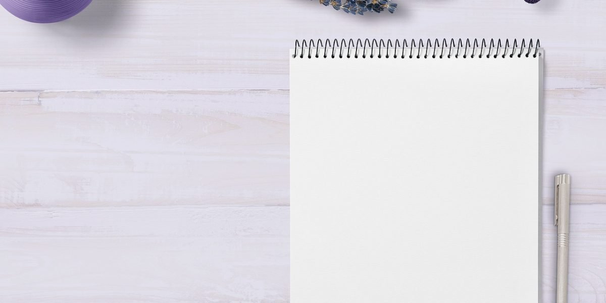 A person engaging in self-reflection and writing, symbolizing maintenance of therapy skills.