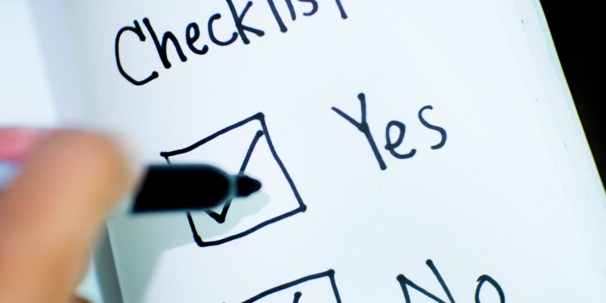 A person carefully reviewing options, symbolizing the thoughtful process of selecting a suitable therapist.