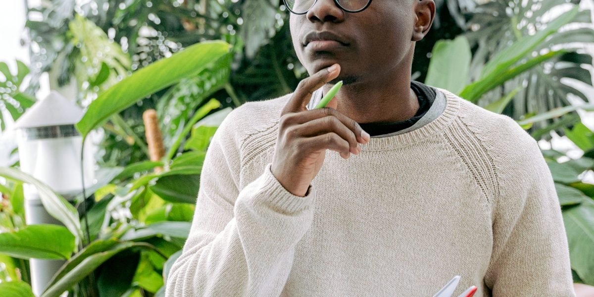 A person having a clear moment of understanding or insight, connecting complex ideas.