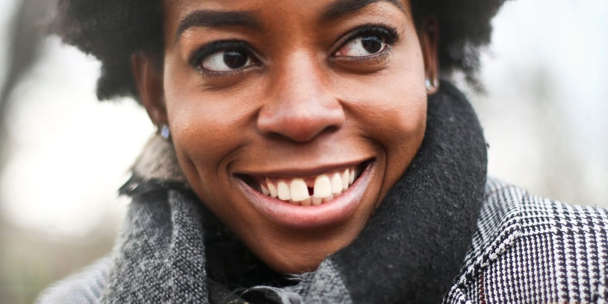 A woman with a confident and hopeful expression, symbolizing the positive outcomes and improvements achieved through effective therapy.