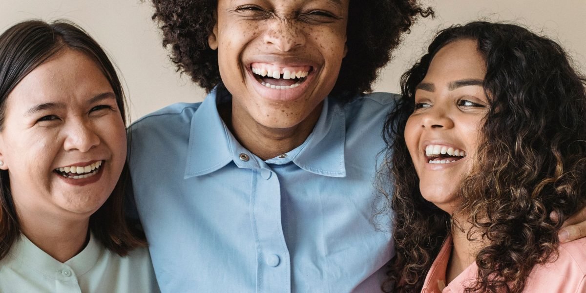 Diverse women participating in an online group therapy session, fostering connection and mutual support.